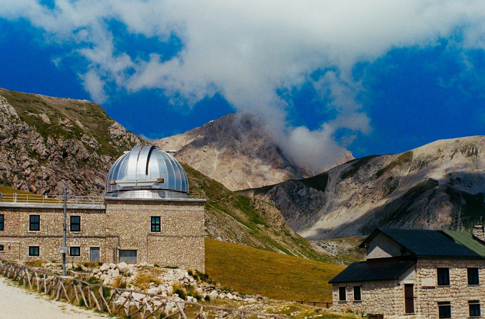 Observatory building in a mountainous landscape